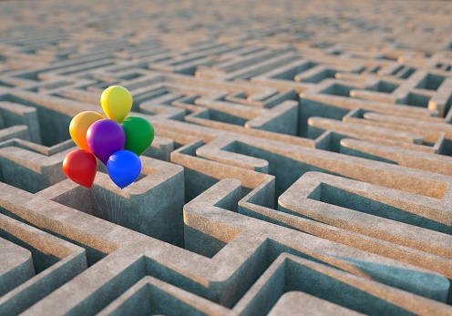 Digital generated image of a maze with colorful balloons