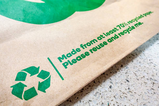 Brown paper bag that is made from at least 70% recyclable and reusable paper stock photo