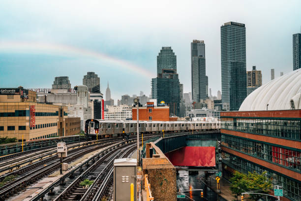 istock New York City subway train is approaching an elevated subway station in Queens 1451754703