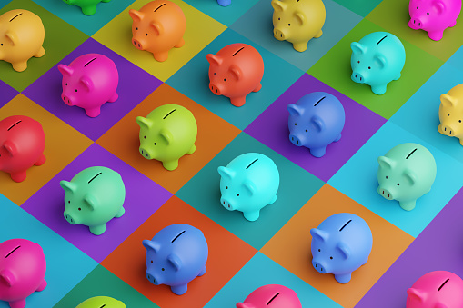 Conjunto de alcancías en colores saturados sobre fondo de alto contraste de color. Ilustración del concepto de ahorro bancario, inversión financiera y múltiples fuentes de ingresos photo