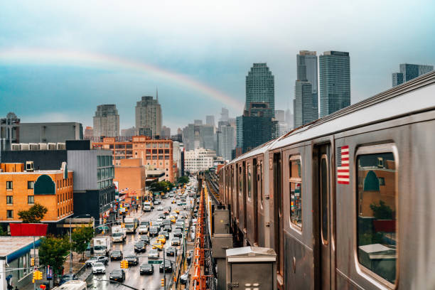 istock New York City subway train is approaching an elevated subway station in Queens 1451754716