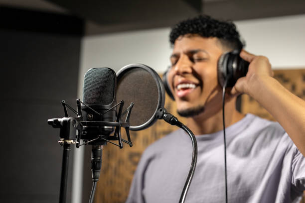 istock Playback singer recording album in the studio 1451758825