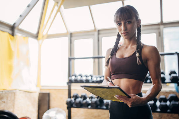 istock Fitness trainer in gym 1451759813