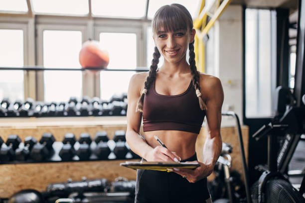 istock Fitness trainer in gym 1451759849