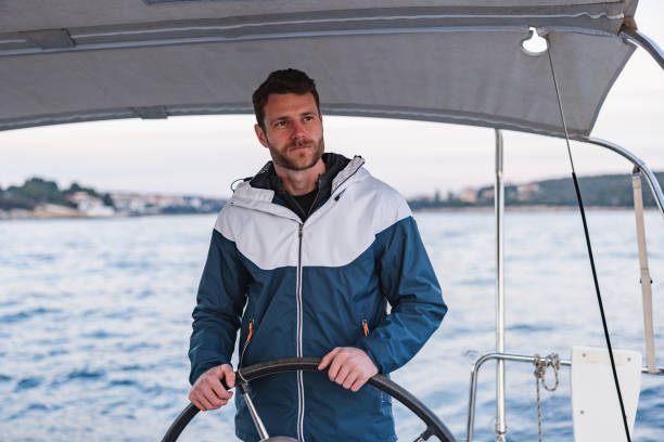 istock Caucasian Good Looking Sailor Looking Serious At The Horizon 1451761790