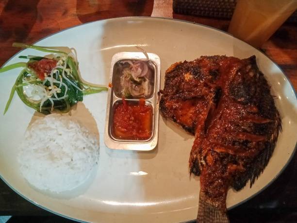 istock spicy sauce grilled fish rice 1451764138