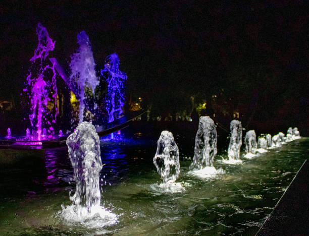 istock Multi-colored Fountain at Night. Lights At Night 1451764160