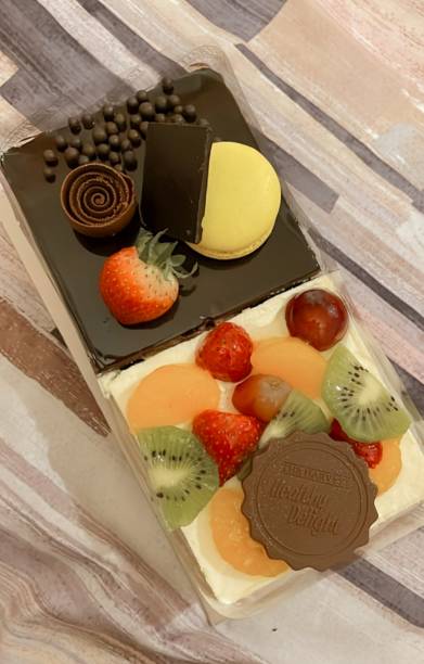 istock various kinds of fruits and cakes 1451764171