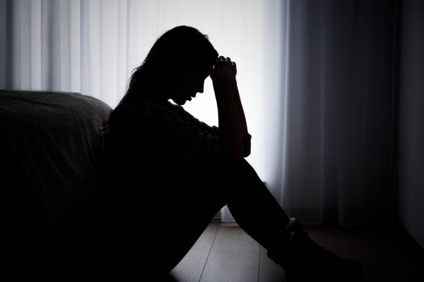 Depressed woman. Sadness and headache concept Woman suffering from depression. Sadness and headache concept despair stock pictures, royalty-free photos & images