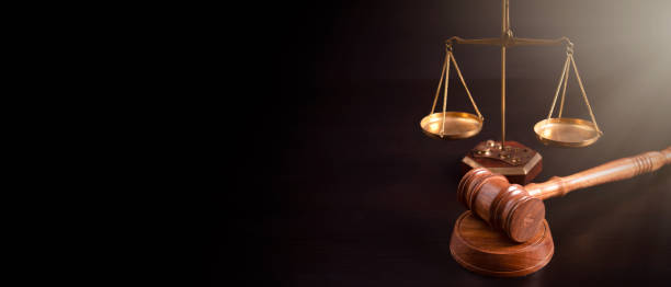 istock Judge's gavel and scale. Law and justice system 1451768400