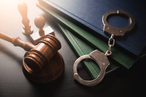 istock Crime and violence concept with handcuffs 1451768433