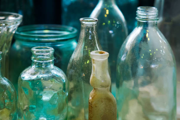 Decorative Glass Bottles And Vases Group Of Small Old Glass Green Bottles  Once Used In Pharmacy To Contain Medicine Stock Photo - Download Image Now  - iStock