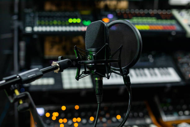 istock Microphone in a professional recording or radio studio 1451777381