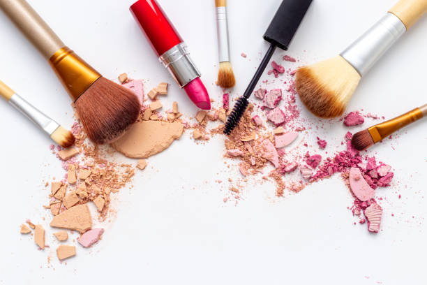 istock Crushed face powder make up with brush isolated on white background 1451779029