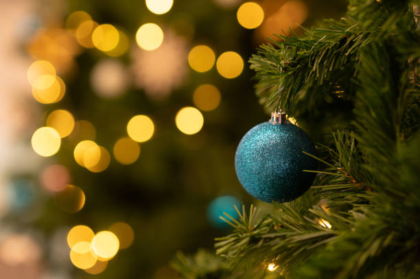istock Focus on ball at Christmas tree on New Year's day 1451779215