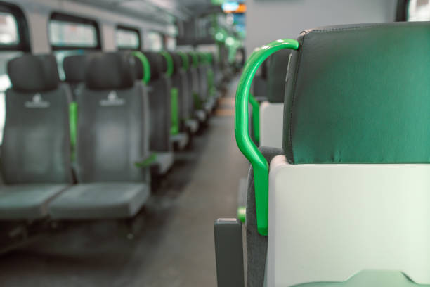 istock Image with the interior of a german border train. A modern train with comfortable and colorful chairs. 1451782135