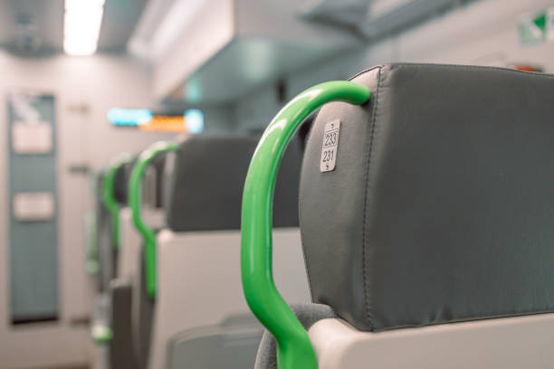 istock Image with the interior of a german border train. A modern train with comfortable and colorful chairs. 1451782390