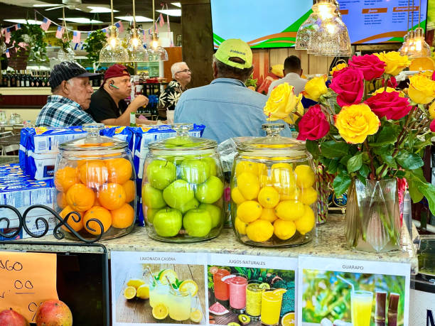 Afternoon Cuban Lunch A lunch counter at one of many Miami, Florida Cuban groceries with a diner counter. kendall stock pictures, royalty-free photos & images