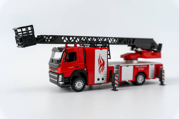 istock toy fire truck on a white background. Emergency vehicle. 1451798560