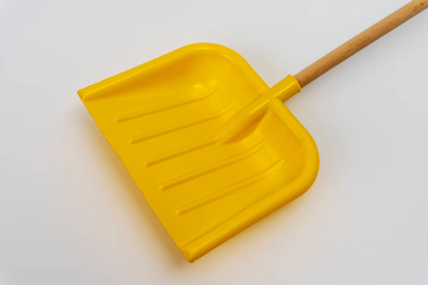 istock bright yellow plastic children's snow shovel with wooden handle 1451800005