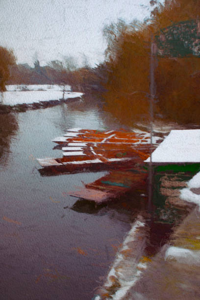 istock Snow on punts moored in the River Cam 1451803824