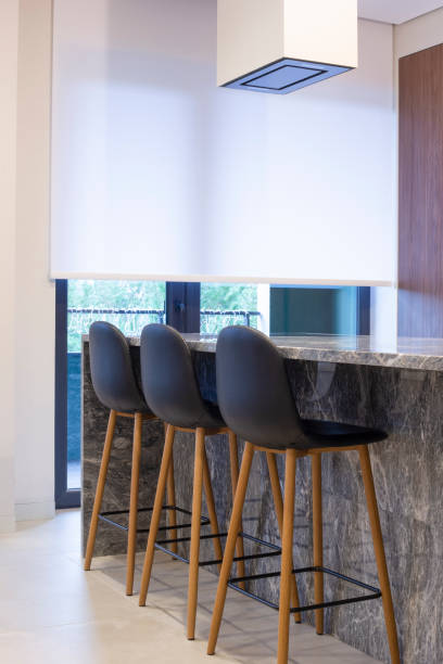 istock Roller blind large size on the window in the interior. 1451804826
