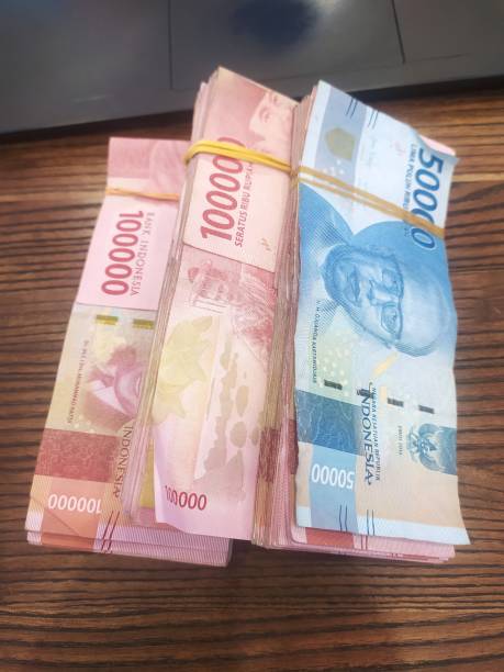 istock Money on top desk 1451810109