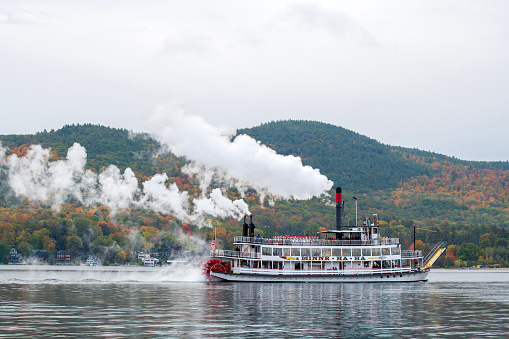Lake George, USA - October 10, 2022. Tourists on streamboat of Minne Ha Ha sailing on Lake George, New York, USA