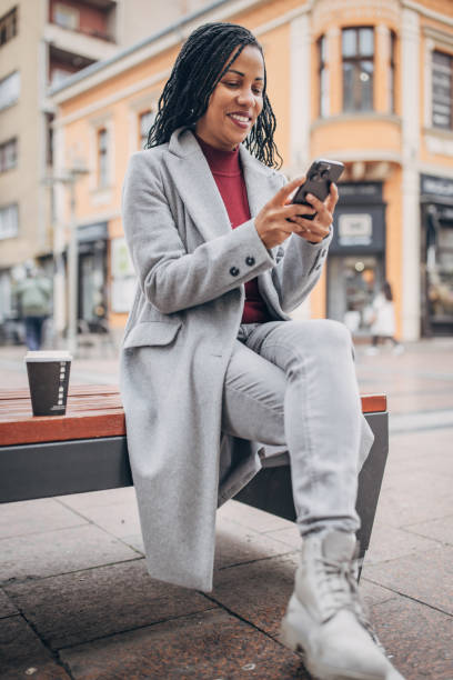 istock Modern woman in city 1451821232