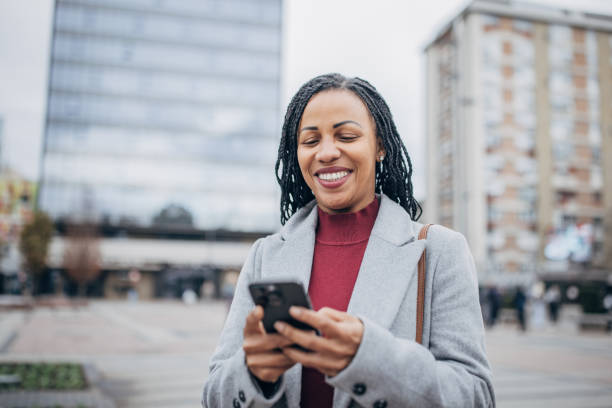 istock Modern woman in city 1451826355