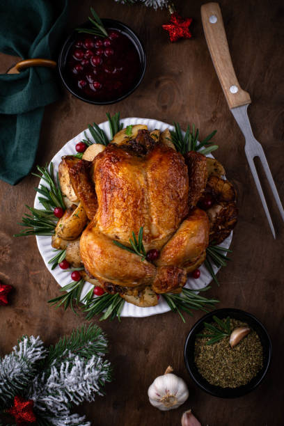 istock Christmas baked chicken for festive dinner. 1451827313