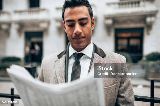 Business Man Reading A Newspaper On The Street Stock Photo - Download Image Now - Newspaper, Reading, One Person