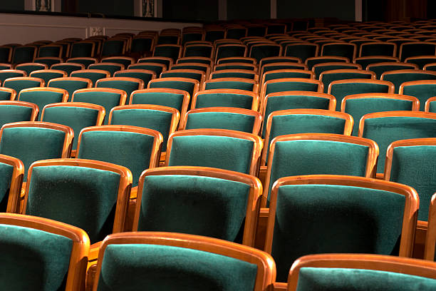 istock Empty chairs at cinema or theater in a row 145183734