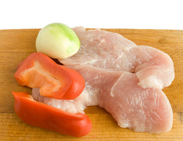 Raw meat with vegetables stock photo