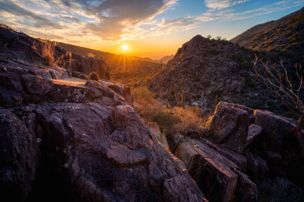 istock Sunset illuminates rugged desert mountain with petroglyphs inscribed on the rocks below 1451842705