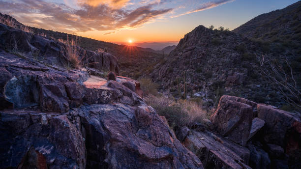 istock Sunset illuminates rugged desert mountain with petroglyphs inscribed on the rocks below 1451842773