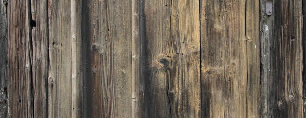istock an old weathered wooden wall 1451845952