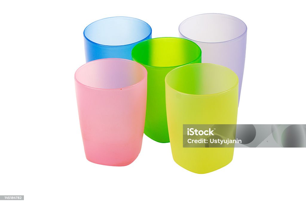 Three color glasses isolated on a white background Three color plastic glasses isolated on a white background Blue Stock Photo