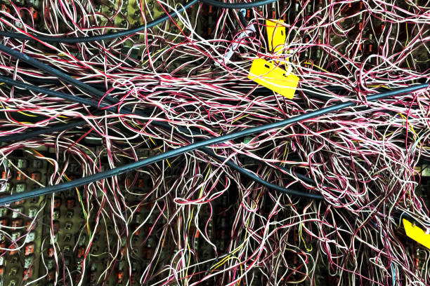 istock Many cables in phone connector box 1451851840