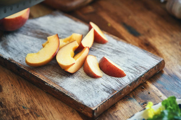 istock Preparing Steak with Arugula Peach Salad 1451853448