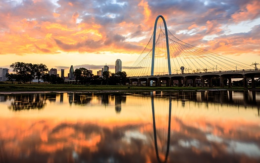 A beautiful view of sunrise over the Margaret Hunt Hill Bridge. Dallas, Texas