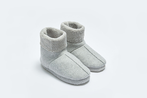 Woollen slippers boots on white background
