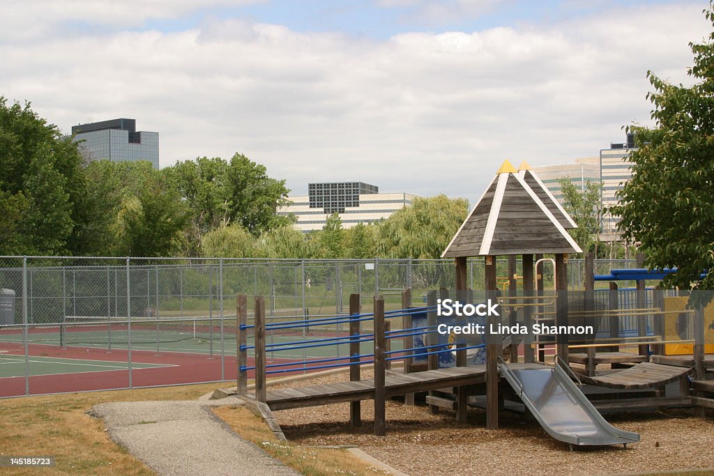 Suburban Community Playground A neighborhood playground with office buildings and tennis courts. Schaumburg - Illinois Stock Photo