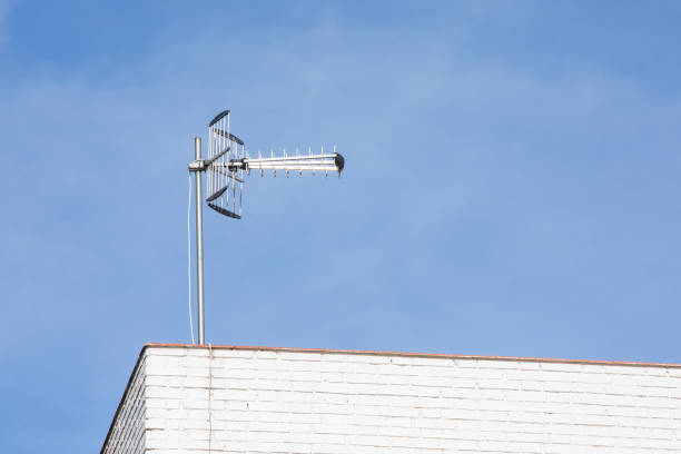 istock Television Antenna,  television aerial on a clear blue sky 1451859047