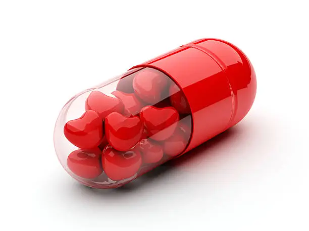 red pill filled with hearts