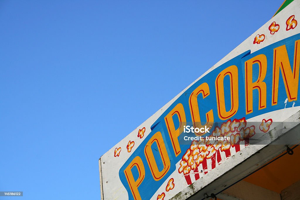 Popcorn accedere al parco divertimenti - Foto stock royalty-free di Carnevale scolastico