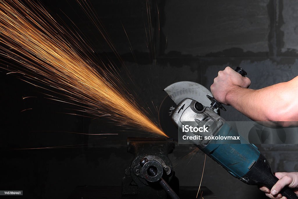 Circular Metal Cutter And Sparks Stock Photo - Download Image Now