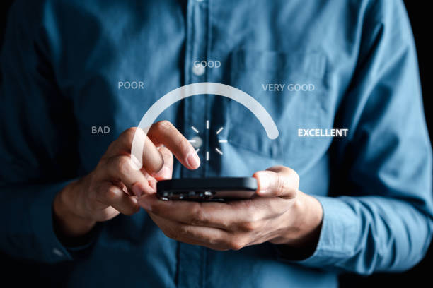 istock Businessman using smartphone to selection Excellent level for client evaluation feedback and customer satisfaction review best service concept. 1451866115