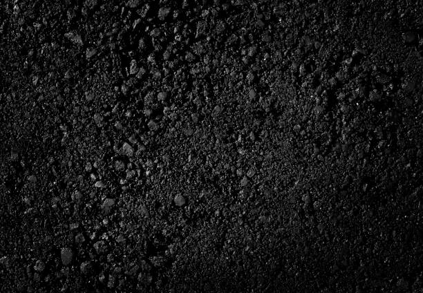 istock Close-up of black asphalt with texture background 1451872372