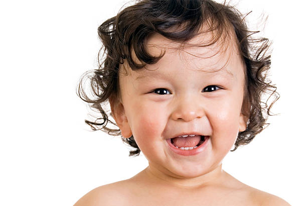 istock Happy baby smiling at camera, with white background  145188363